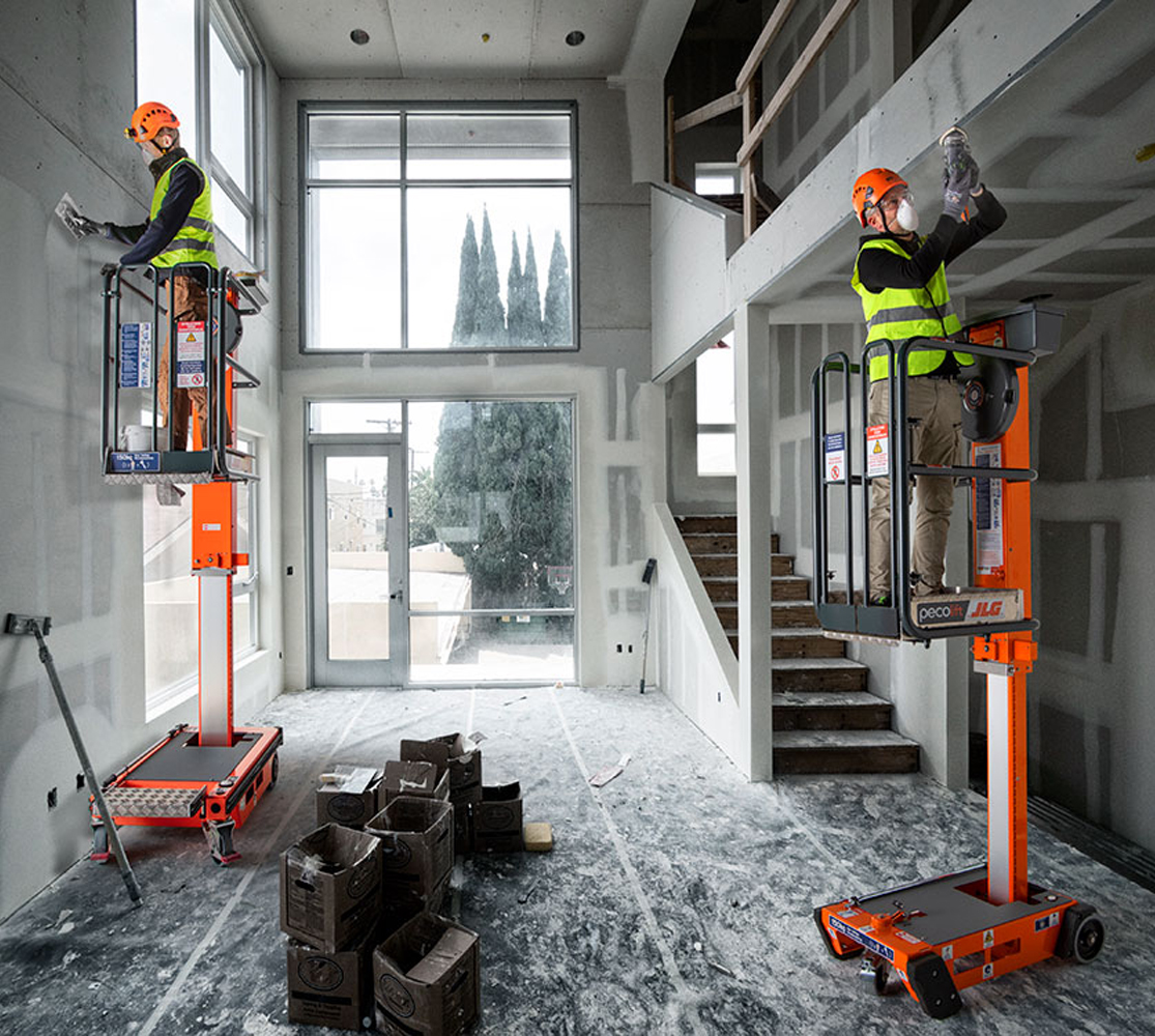 Pecolift and Ecolift mobile elevated platforms, two man working on elevated MEWPs
