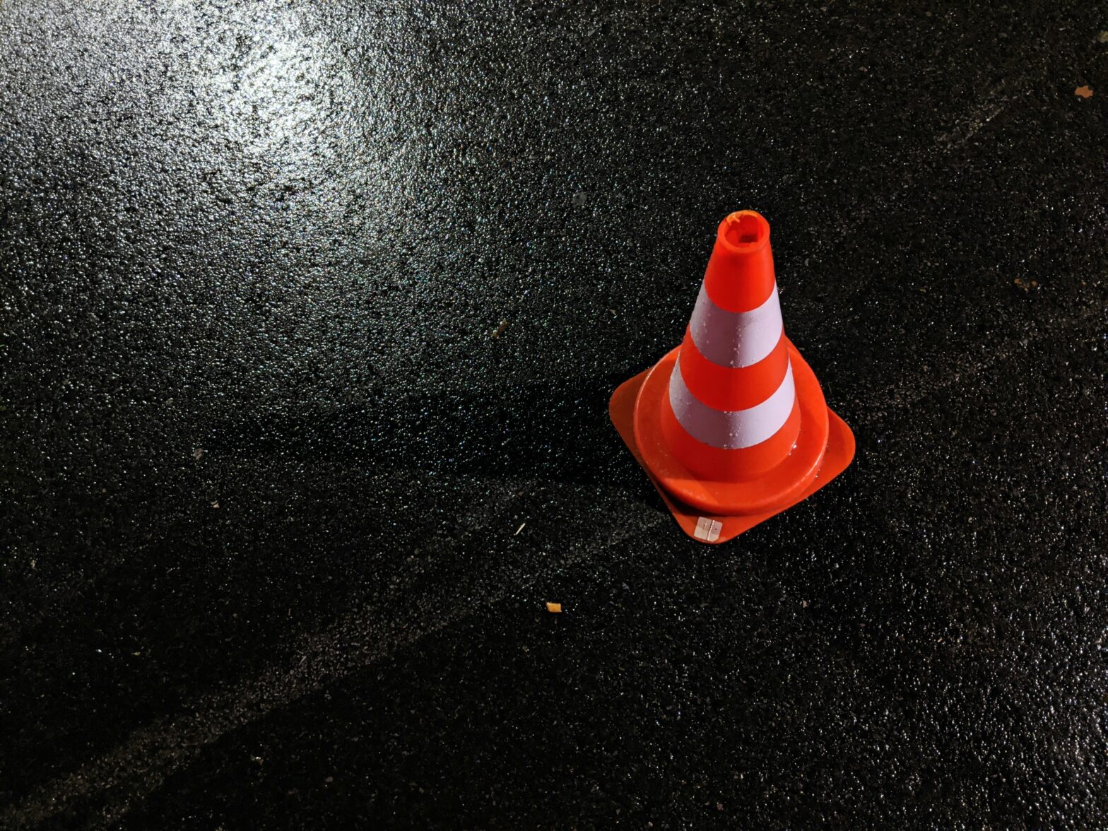 Traffic cone in the middle of a road